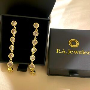 Gold bezel cut zirconia linear drop earrings